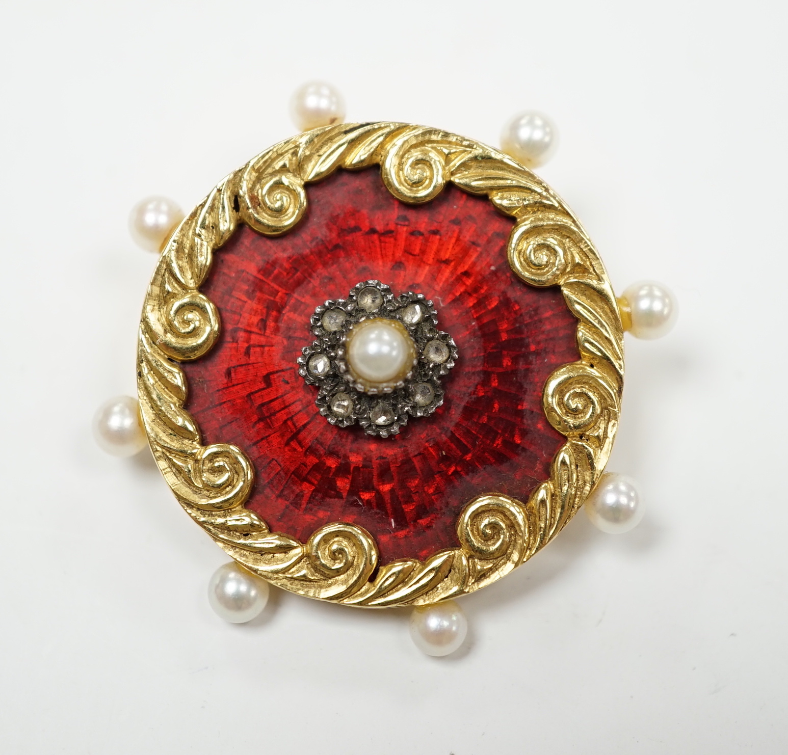 A 1960's 18ct gold, seed pearl, enamel and rose cut diamond set circular brooch, 35mm, gross weight 11.1 grams.